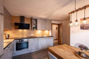 Η κουζίνα ή μικρή κουζίνα στο Ferienwohnung Pulverer +4 φωτογραφίες