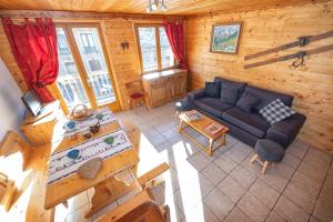 an overhead view of a living room in a cabin at Chalet L’Etagne in Bessans