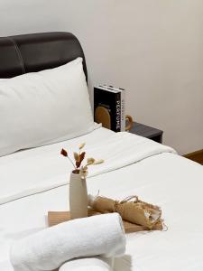 Postel nebo postele na pokoji v ubytování Da Men Subang Jaya USJ by Iconique