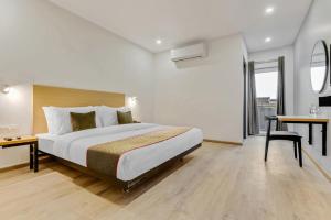 Postel nebo postele na pokoji v ubytování Hotel New City Lite