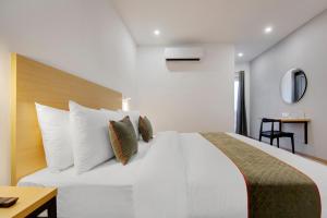 Postel nebo postele na pokoji v ubytování Hotel New City Lite