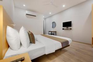 TV a/nebo společenská místnost v ubytování Hotel New City Lite