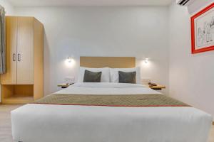 Postel nebo postele na pokoji v ubytování Hotel New City Lite