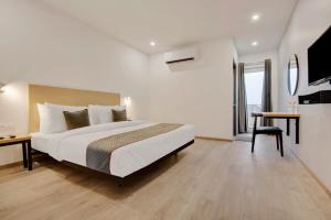Postel nebo postele na pokoji v ubytování Hotel New City Lite