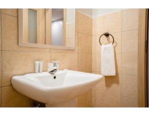 Koupelna v ubytování Blooming Suites