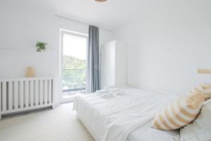 Ένα ή περισσότερα κρεβάτια σε δωμάτιο στο Place for a Beautiful Morning