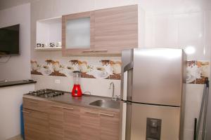 Kuchyň nebo kuchyňský kout v ubytování Condominio Tolima
