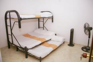 Postel nebo postele na pokoji v ubytování Condominio Tolima