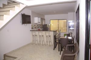 TV a/nebo společenská místnost v ubytování Condominio Tolima