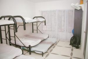 Postel nebo postele na pokoji v ubytování Condominio Tolima + 23 fotografií