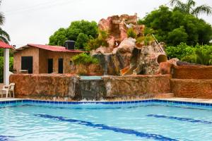 Bazén v ubytování Condominio Tolima nebo v jeho okolí