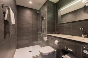 Koupelna v ubytování Leonardo Hotel Groningen