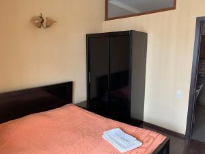 Postel nebo postele na pokoji v ubytování Snow Plaza Apartments 46