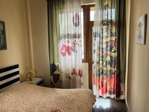 Postel nebo postele na pokoji v ubytování Snow Plaza Apartments 46