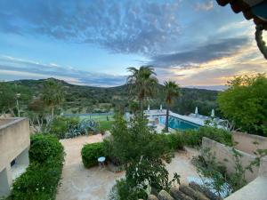 an aerial view of a villa with a swimming pool at Son Vent in Caʼs Concos