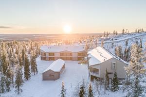 an aerial view of a home in the snow at Aurora Gielas B5 Ski-in Ski-out, Mountain View by Aavalevi in Levi