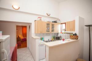 a kitchen with a sink and a counter top at Apartment Antea in Tučepi