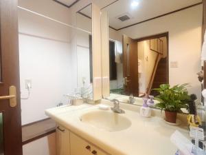 Koupelna v ubytování Jl千住別荘 + 32 fotografií