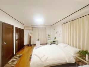 Letto o letti in una camera di Jl千住別荘