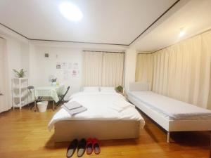 Letto o letti in una camera di Jl千住別荘