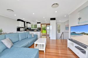 Kuchyň nebo kuchyňský kout v ubytování Bliss at Shoal Bay