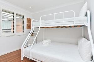 Postel nebo postele na pokoji v ubytování Bliss at Shoal Bay