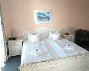 Postel nebo postele na pokoji v ubytování Hotel Villa Weststrand
