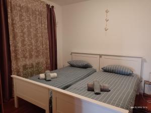 Posteľ alebo postele v izbe v ubytovaní IVA house with apartment