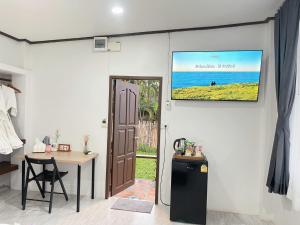 TV a/nebo společenská místnost v ubytování petruntee resort