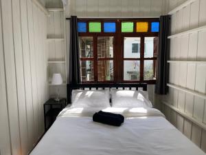 Green Cabin Hostel客房内的一张或多张床位