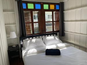 Green Cabin Hostel客房内的一张或多张床位