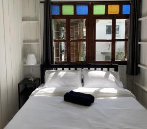 Green Cabin Hostel客房内的一张或多张床位