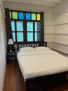 Green Cabin Hostel客房内的一张或多张床位
