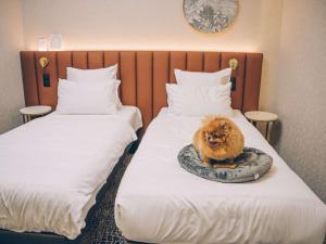 Postel nebo postele na pokoji v ubytování Mercure Bialystok