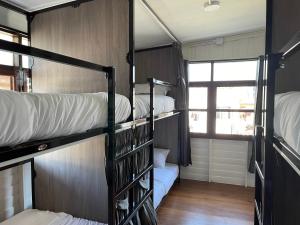 Green Cabin Hostel客房内的一张或多张床位