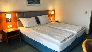 Voodi või voodid majutusasutuse Hotel Siebeneichen toas
