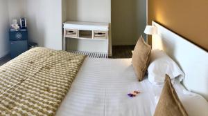 Кровать или кровати в номере Boutique Hotel & Spa la Villa Cap Ferrat