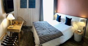 Кровать или кровати в номере Boutique Hotel & Spa la Villa Cap Ferrat