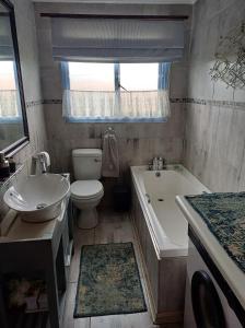 Ένα μπάνιο στο Peace Haven Trappie huis +13 φωτογραφίες