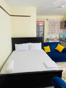 Postel nebo postele na pokoji v ubytování Shalimin Homes- Kilifi Seahorse road