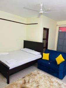 Postel nebo postele na pokoji v ubytování Shalimin Homes- Kilifi Seahorse road + 11 fotografií