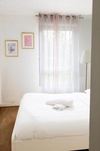 Postel nebo postele na pokoji v ubytování PeaceHome