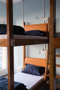 Postel nebo postele na pokoji v ubytování Tara Circle Hostel