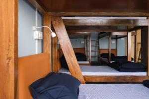 Postel nebo postele na pokoji v ubytování Tara Circle Hostel