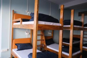 Postel nebo postele na pokoji v ubytování Tara Circle Hostel