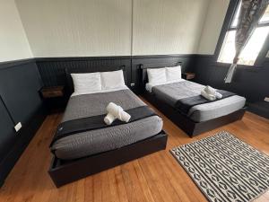 Voodi või voodid majutusasutuse Howzit Hostels Hawaii toas