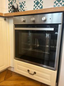 Cozy appartement near Opera and Galeries Lafayette Haussmann的厨房或小厨房