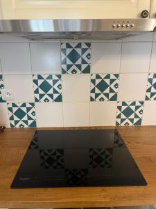Cozy appartement near Opera and Galeries Lafayette Haussmann的厨房或小厨房