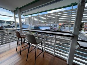 Green Cabin Hostel的阳台或露台