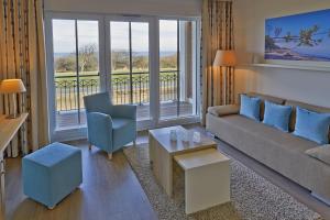 Posezení v ubytování Aparthotel Waterkant Suites - Fewos am Meer mit SPA